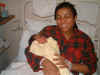 Mum looking exsusted but happy.