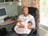 Asleep in dads arms.